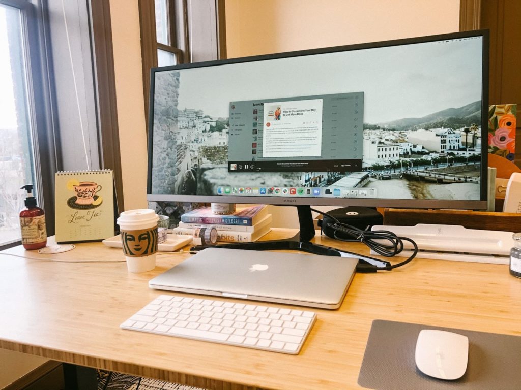Sarah Klongerbo's office setup, where she listens to Pocket Casts podcasts for creative entrepreneurs