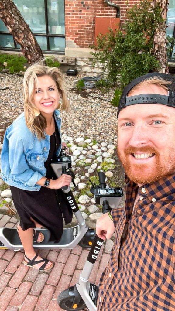 Sarah and Troy Klongerbo on scooters in Kansas City