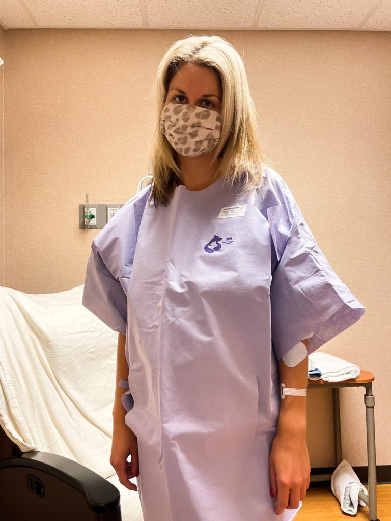 Sarah Klongerbo in a hospital gown before her D+C surgery