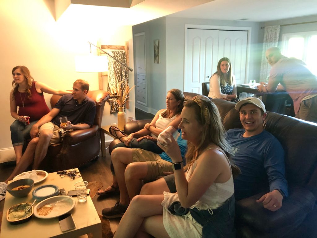Sarah Klongerbo's family watching golf in her basement