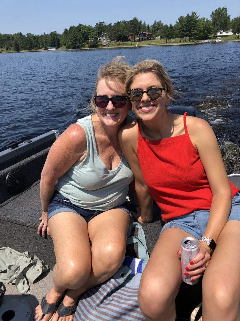 Amy and Sarah Klongerbo on a boat in Minnesota