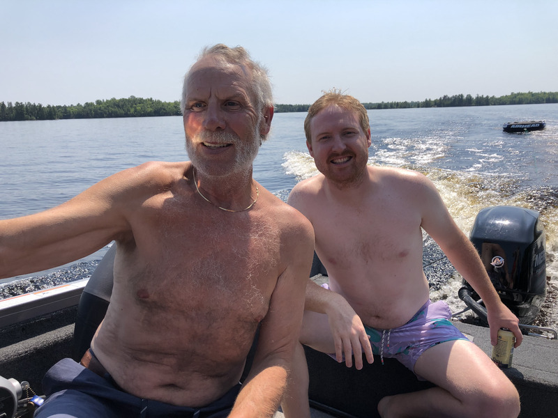 Troy and Mike Klongerbo on a boat in Minnesota