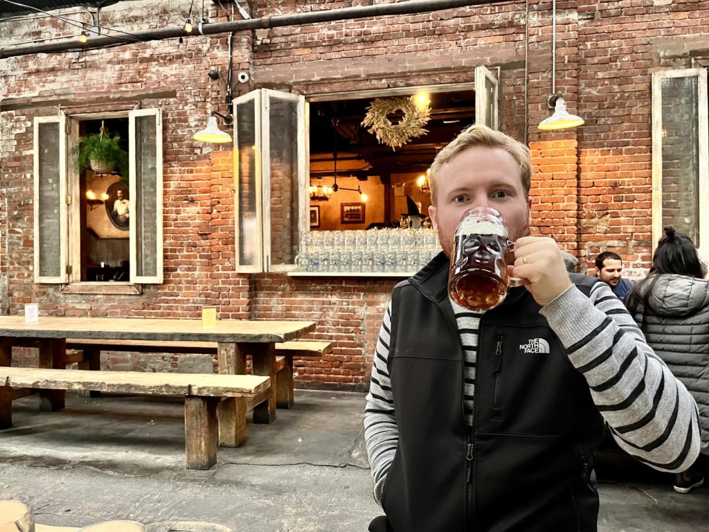 Troy Klongerbo drinking beer in Williamsburg, Brooklyn