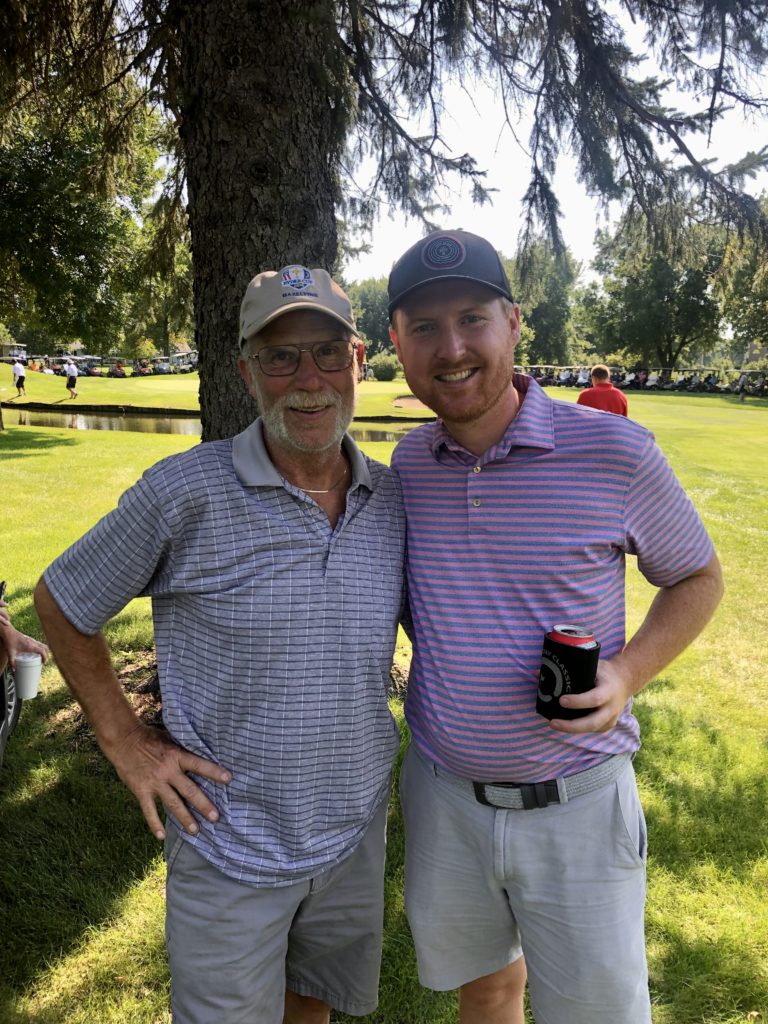 Troy Klongerbo and his dad on the golf course