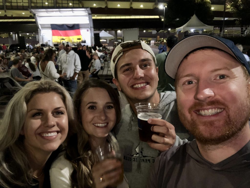 Sarah and Troy Klongerbo and her brother and sister-in-law at Germanfest in Sioux Falls
