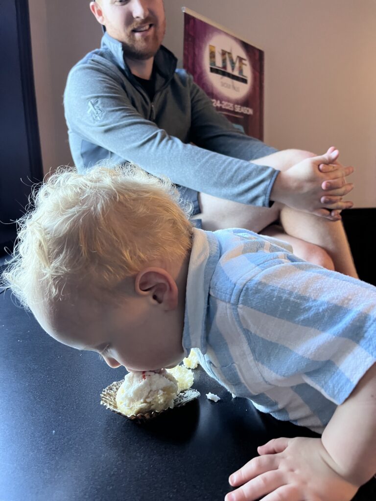 Calvin Klongerbo eating a cupcake