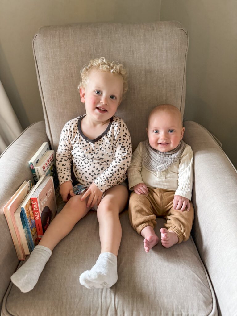 Calvin and Wesley Klongerbo on a chair